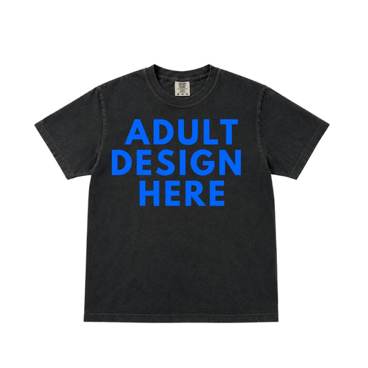Black Comfort Colors® garment-dyed adult t-shirt mockup displaying the words "Adult Design Here," representing a premium custom t-shirt design and printing service with multiple color options available.